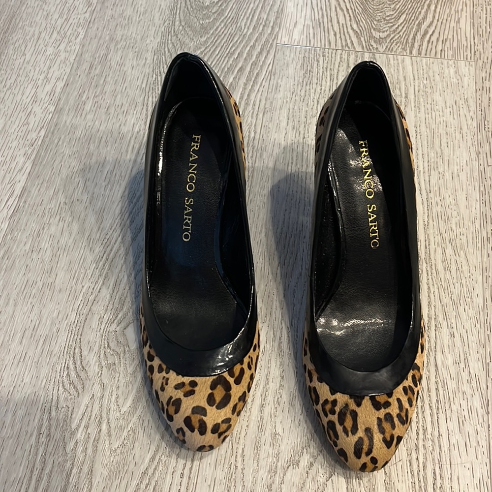 Fun leopard pattern. Leather and man-made material. Low comfortable heel